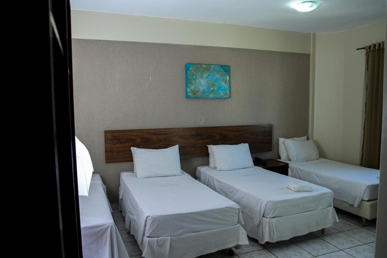 Quarto Quádruplo Premium