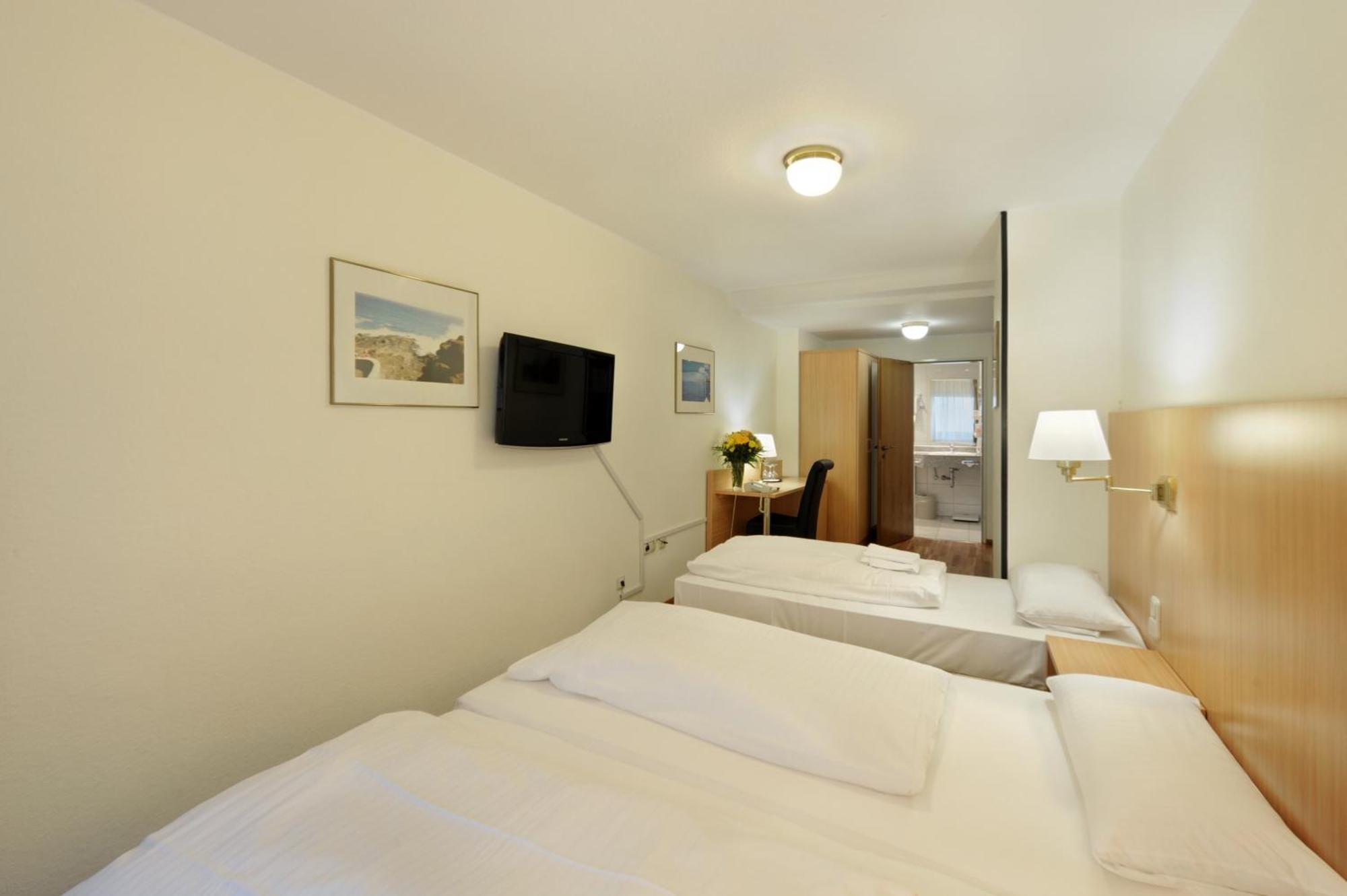 Dreibettzimmer