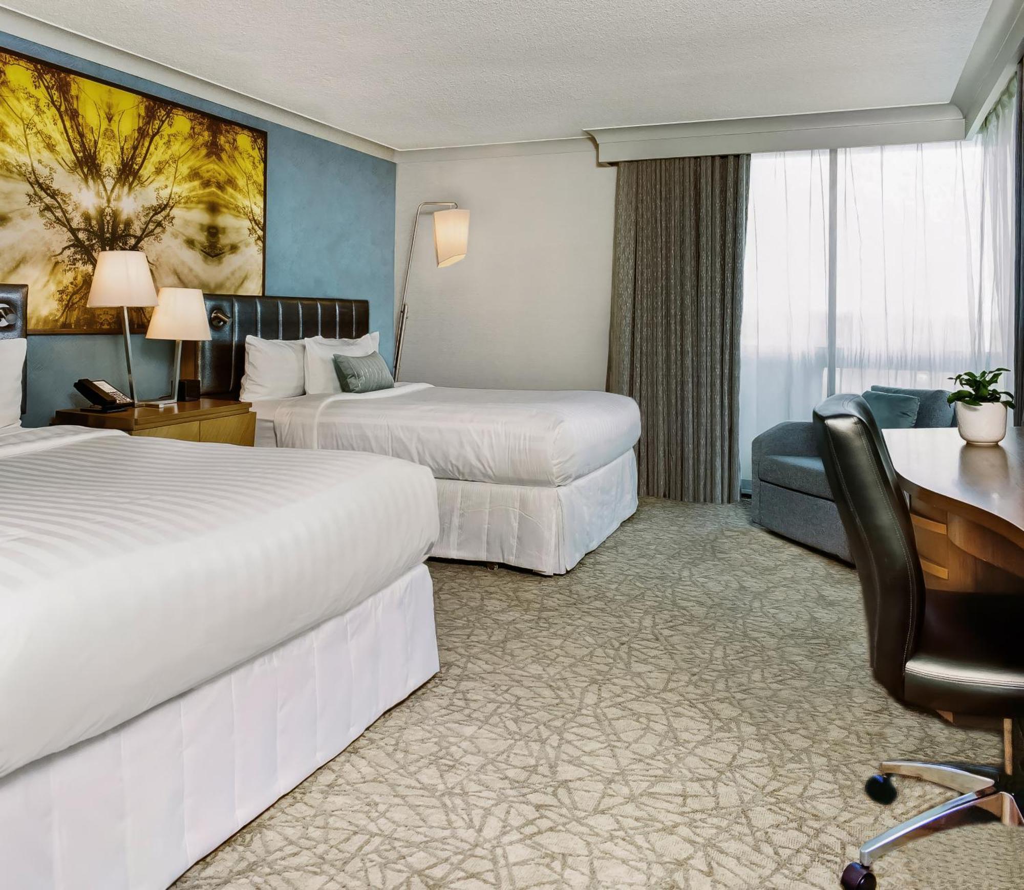 Premium Queen Room with Two Queen Beds, Additional Living Area and Ravine View