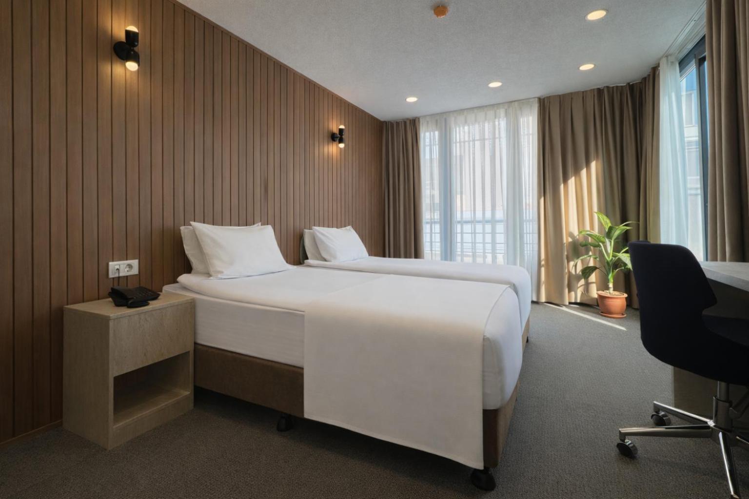 Luxe Kamer met 1 of 2 Bedden en Balkon