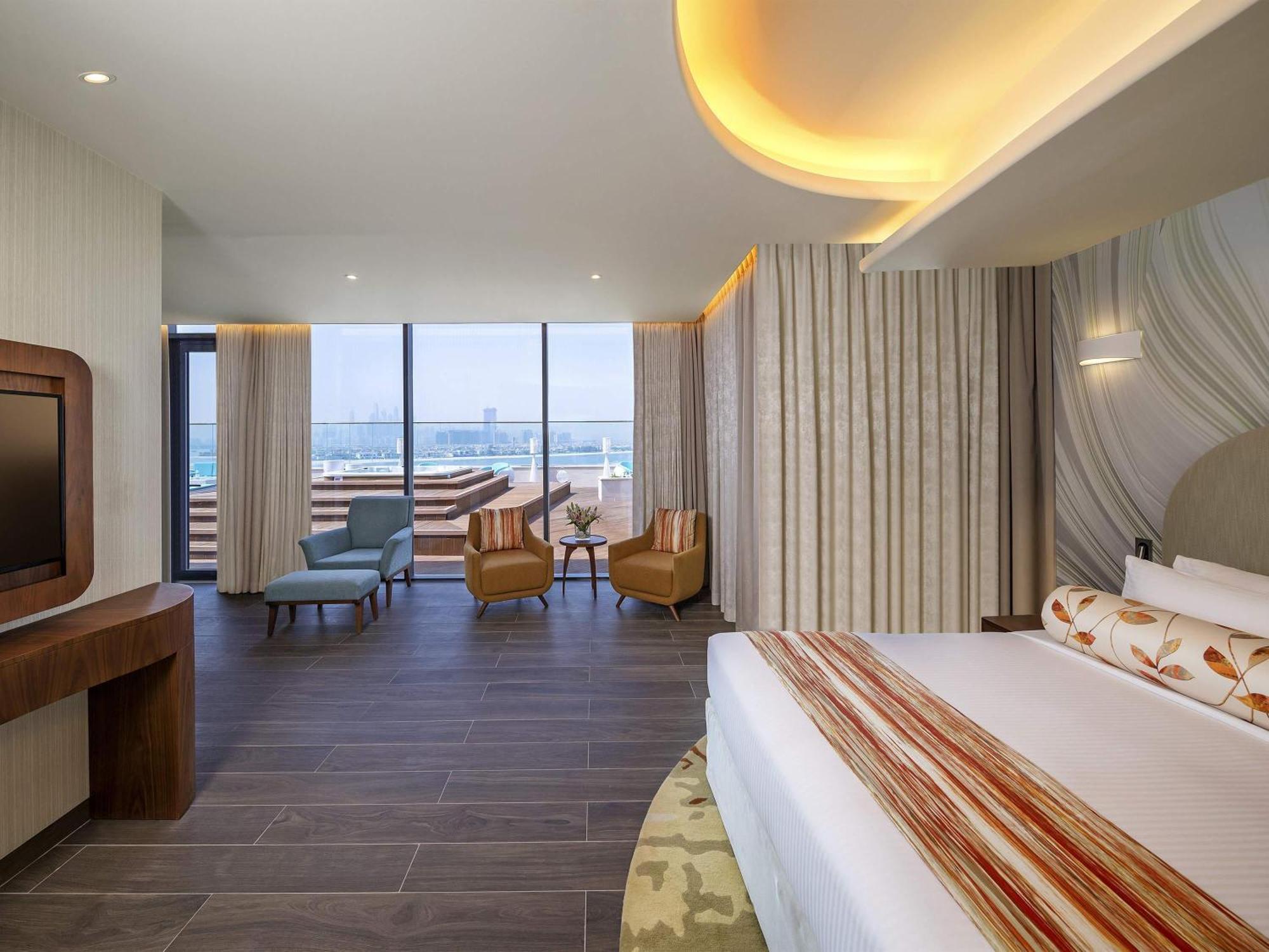 Penthouse Suite met Kingsize Bed en Dakterras - Uitzicht op de Palmzee - Toegang tot de Club Lounge/Strand