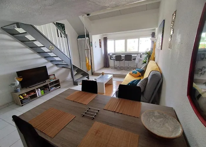 Pélican duplex avec piscine commune dans résidence