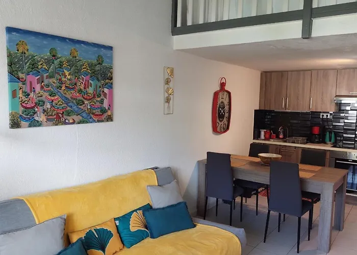 Pélican duplex avec piscine commune dans résidence