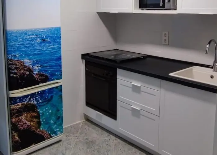 Acogedor apartamento en Daimús a 150 metros de la playa con parking privado y piscinas comunitarias