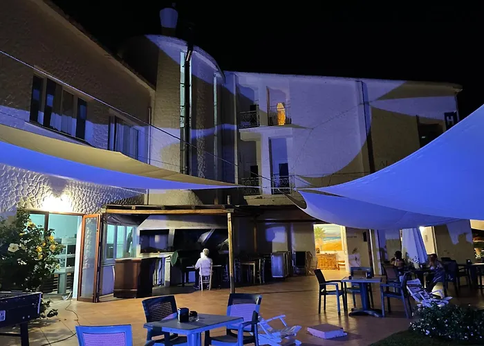 HOTEL Al FARO , SPIAGGIA LA CINTA ,SAN TEODORO