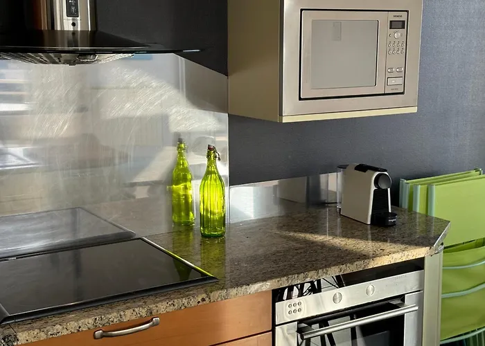 "Seaside Serenity: Central City Apartment with Ocean Views"