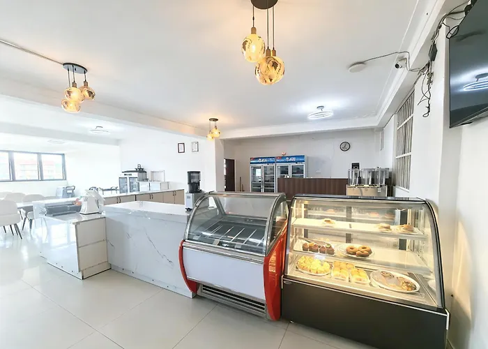 Ucha Hotel & Suites