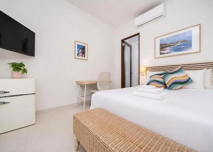 Room 13: Breezy Veranda Stay With City Views