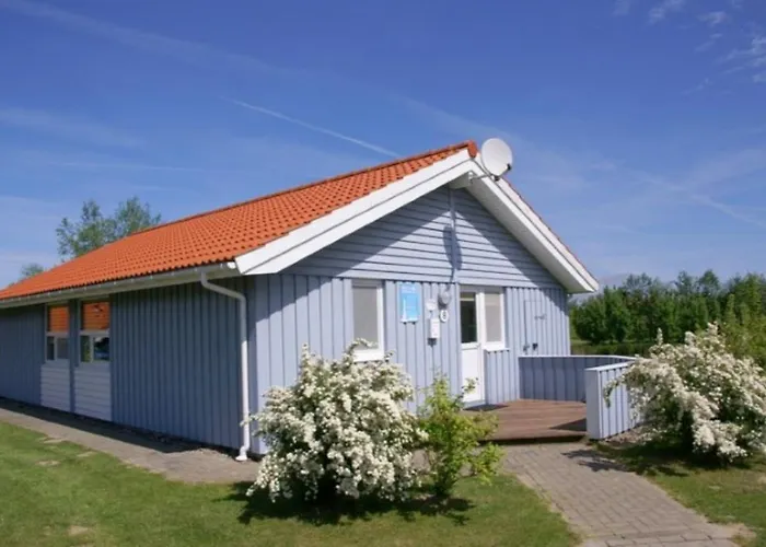 6 Personen Ferienhaus mit privatem Bootsteg, direkter Seelage, Kanu, Whirlpool und Sauna in Otterndorf